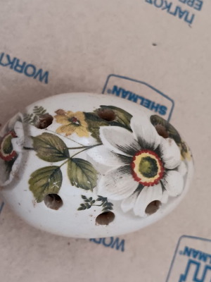 Ceramic incense stick holder egg-shaped used, floral design