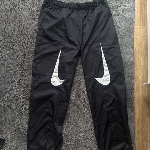Nike windbreaker pants, black, size M