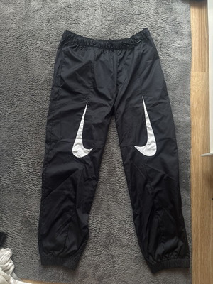 Nike windbreaker pants, black, size M