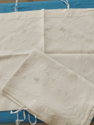 Vintage pair of handmade pillowcases with white embroidery, like new