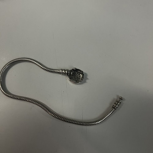 Pandora bracelet 17cm like new with charm, clasp repair needed