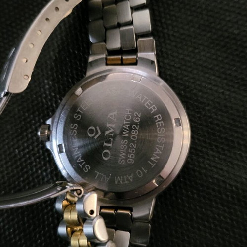 Olma Sapphire Seven Seas wristwatch like new, Swiss made