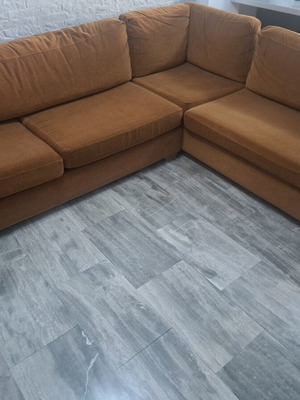 Corner sofa used, modern terracotta color with removable covers