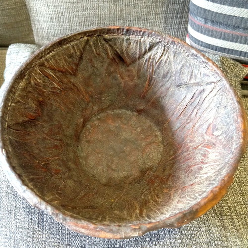 Antique carved wooden bowl with leather lining used