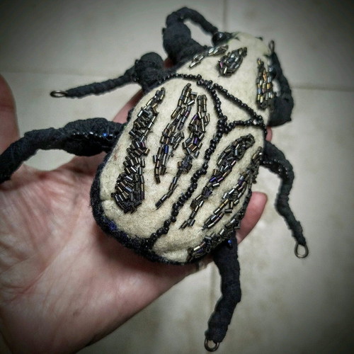 Art object Beetle new fabric with beads
