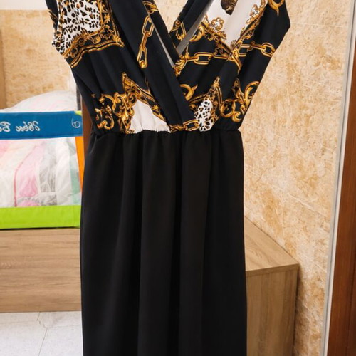 Jumpsuit like new, black and gold, sizes S–M