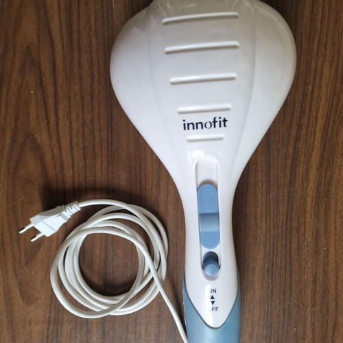 Innofit Hand Massager used with three interchangeable heads