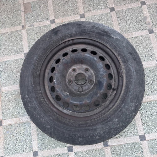 Used 195/65/R15 tires with steel rims, set of 4