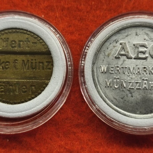 Lot of two old AEG tokens