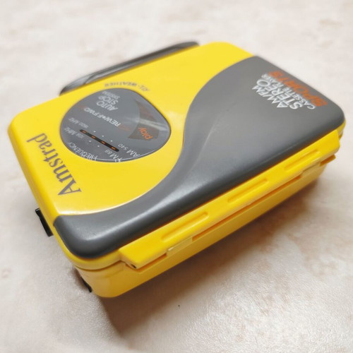 Amstrad All Weather Sports Vintage Walkman used, yellow cassette radio