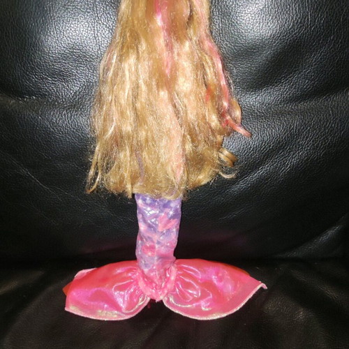 Barbie mermaid doll used with secret door