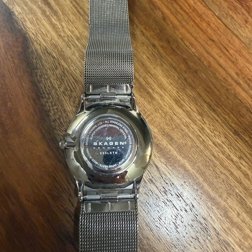 Skagen watch used with blue dial and silver bracelet