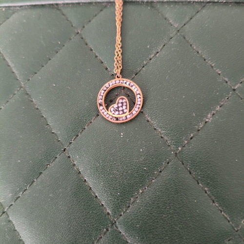 Rose gold necklace with heart and black rhinestones used