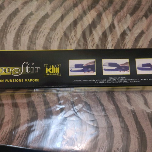 KLM VapoStir Steam Straightener used with steam function