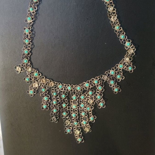 Vintage necklace used with turquoise stones and plated metal