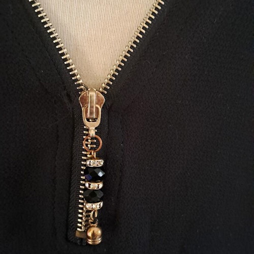 Black tunic with zipper and decorative beads used, women's one size