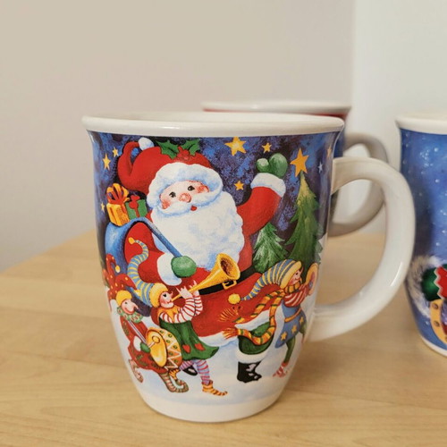 Set of 7 used Christmas mugs in two sizes