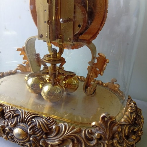 400-day mechanical clock with glass dome