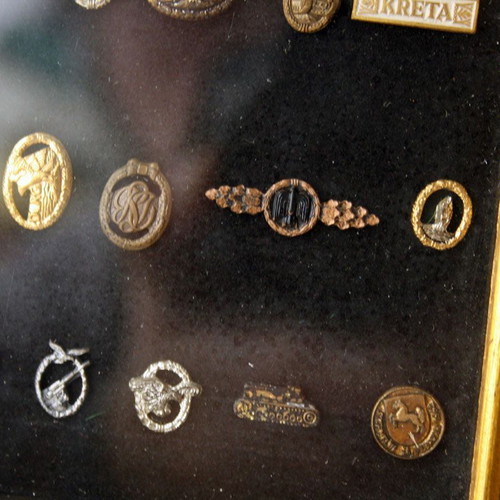 Frame with 27 old German Nazi military badges from World War II like new