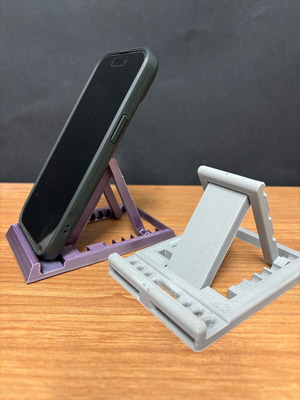 Phone stand with adjustable positions new, for all phones