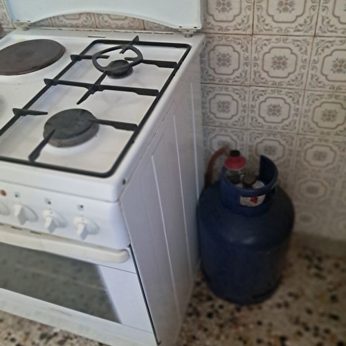 Kitchen stove with 2 gas and 2 electric burners