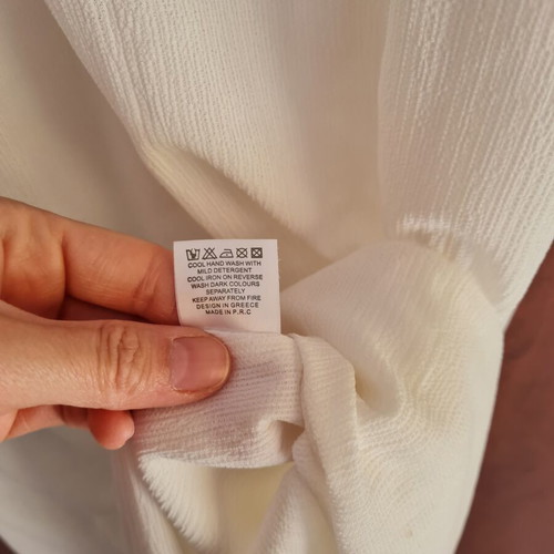 Doca dress new, white, fits small and medium sizes