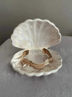 Bracelet new with wavy design in rose gold tone