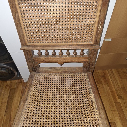 Vintage chair used with cane seat and carved details