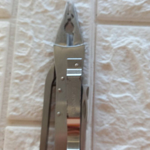 Pocket multitool used, stainless steel with case