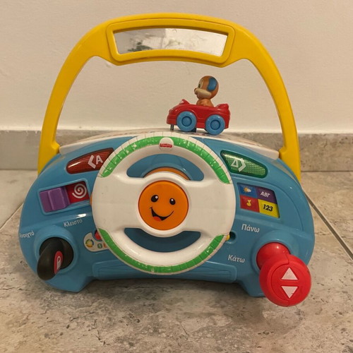 Fisher Price driving toy used with sounds and activities