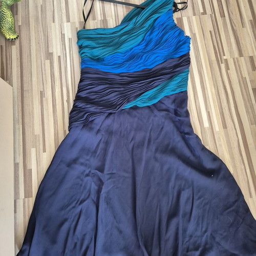 Official dresses in blue-green and black-gold XL, others S
