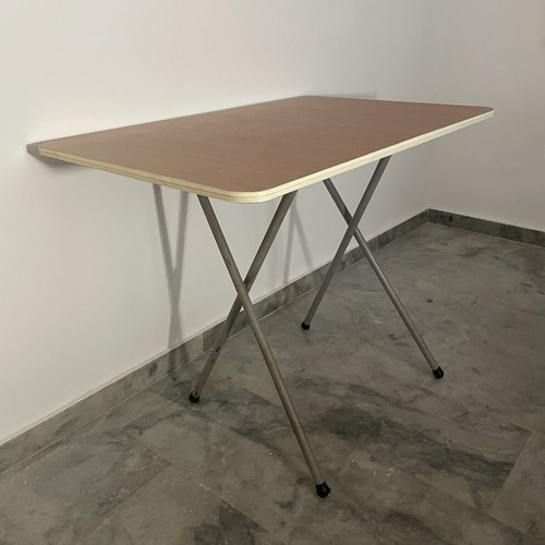 Folding table used with metal base and brown melamine top