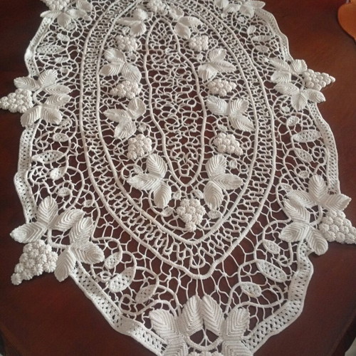 Antique handmade crochet table linen with grape cluster design used