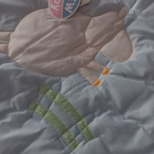 New Baby hypoallergenic baby quilt with ruffles