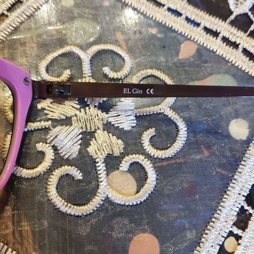 El Gio eyeglasses used, pink and purple frame 54-17-140