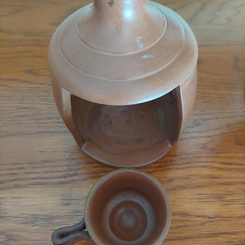 Ceramic Candle Holder like new, terracotta cut-out design