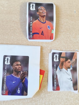 Coca Cola FIFA World Cup 2026 football stickers Eduardo Camavinga, Virgil van Dijk, Federico Valverde