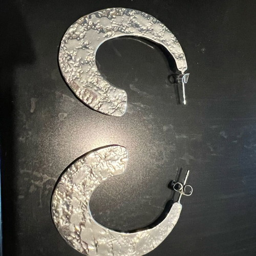 Steel earrings new, silver color