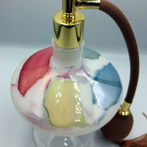 Vintage glass perfume bottle with new atomizer