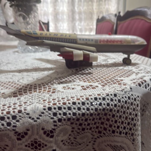 Olympic Boeing 707 model airplane used collectible