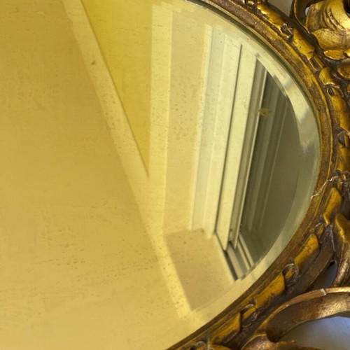 Antique mirror used with hand-carved frame over 100 years old