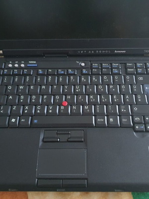 IBM Lenovo ThinkPad T400 laptop with docking station