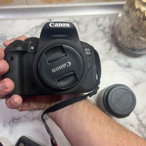 Canon 700D used with two lenses 18-55 and 24mm, two batteries