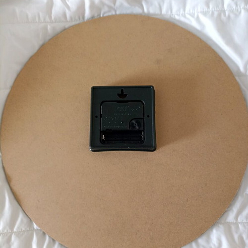 Decorative wall clock used, analog with floral design