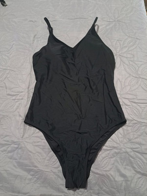 Black one-piece swimsuit like new, size S with V-neck and thin straps
