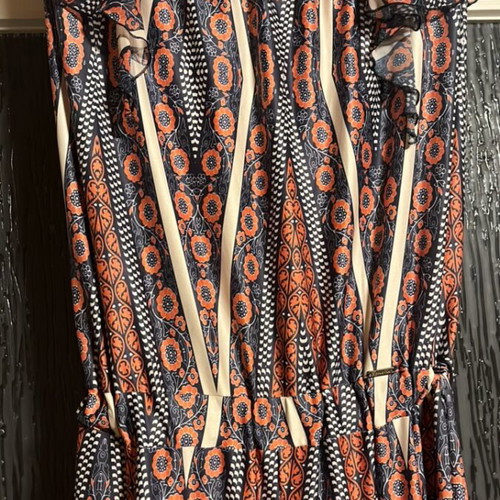 Women's jumpsuit like new, size L, colorful with ruffles