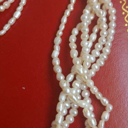 Two freshwater pearl necklaces with gold and metal clasps