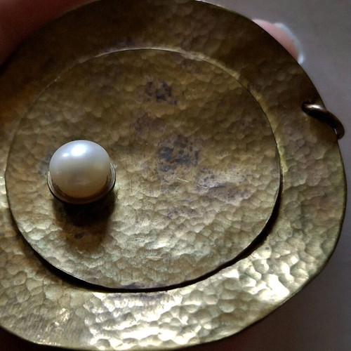 Pendant for necklace used with brown marks
