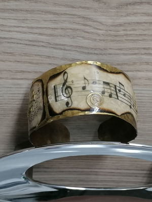 Handmade hammered copper bracelet with musical note design like new