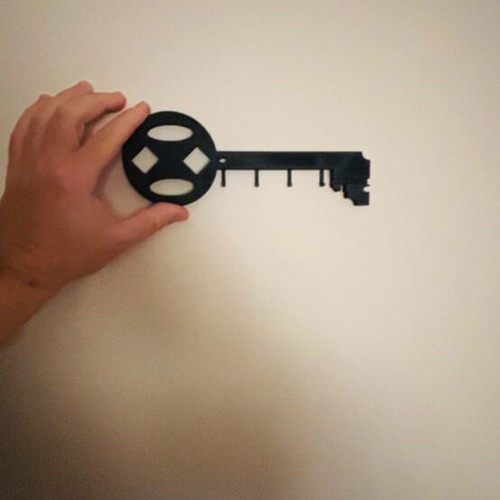 Wall mount key holder for four keys, plastic